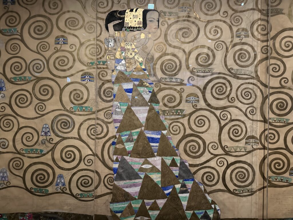 The scene "Waiting" on Gustav Klimt's cardboard for the Stoclet Palace in the Vienna Museum of Applied Arts. Photo by Julia Abramova. Vienna, 2026