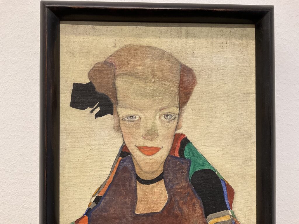 Fragment of the Portrait of Poldi Lodzinsky by Egon Schiele (1910) on display at the Leopold Museum in Vienna. Photo: Art with me! Museum Tours in 2025.